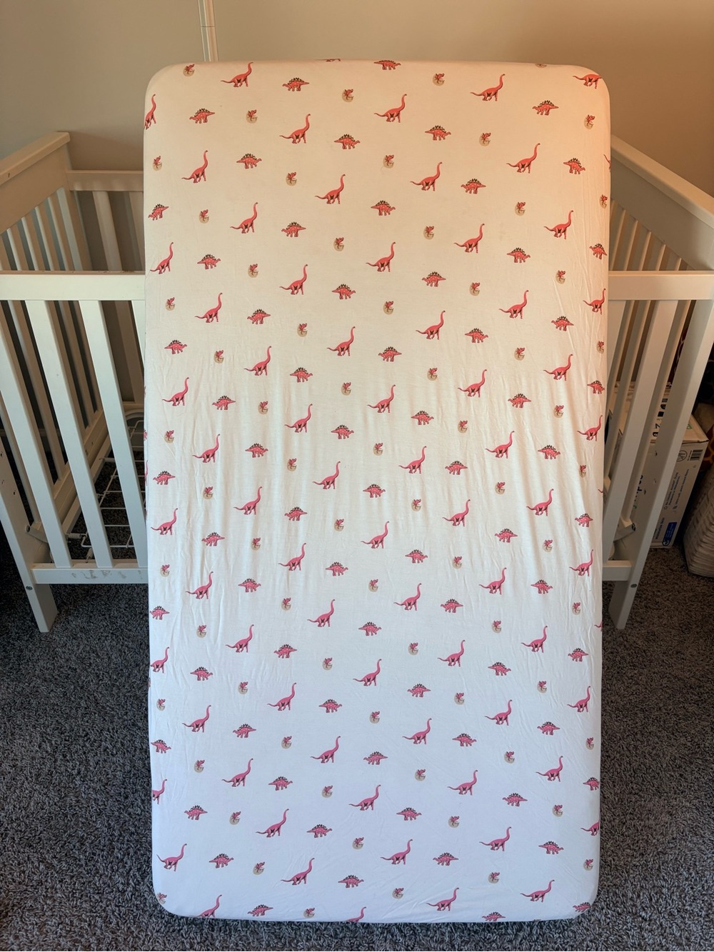 Kyte Baby Rose JurassicWhite Baby Crib Sheet with Pink Dinosaur Print